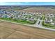 Overhead shot of a neighborhood, showing neat rows of houses and a planned community layout at 371 Bluestem Ln, Whiteland, IN 46184