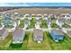 A neighborhood with well-maintained lawns and diverse home styles at 371 Bluestem Ln, Whiteland, IN 46184