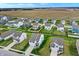 Planned residential neighborhood with green spaces, showcasing neat lawns and house designs at 371 Bluestem Ln, Whiteland, IN 46184