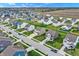 An expansive view of a neighborhood with manicured lawns and tidy landscaping at 371 Bluestem Ln, Whiteland, IN 46184
