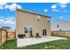 Home's backyard featuring a concrete patio area and a charcoal grill, great for cookouts at 371 Bluestem Ln, Whiteland, IN 46184