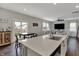 Bright open concept kitchen with large island, adjacent to the dining area and living space at 371 Bluestem Ln, Whiteland, IN 46184