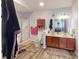 Bright bathroom with double sinks, separate shower and toilet at 3817 Cologne Ct, Indianapolis, IN 46228