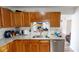 Open kitchen with granite countertops and stylish cabinetry at 3817 Cologne Ct, Indianapolis, IN 46228