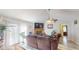 Bright living room showcasing wood-look floors, and access to the backyard at 3817 Cologne Ct, Indianapolis, IN 46228