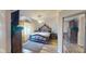 Spacious main bedroom with vaulted ceiling, wood-look floors, and ample natural light at 3817 Cologne Ct, Indianapolis, IN 46228