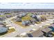 Aerial view of a residential neighborhood showcasing the community layout and surrounding landscape at 3999 Kensington Dr, Danville, IN 46122