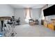 Bright bedroom featuring plush carpeting and window with light-filtering curtains at 3999 Kensington Dr, Danville, IN 46122