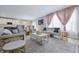 Spacious living room featuring stylish furniture, and an open layout connected to the kitchen at 3999 Kensington Dr, Danville, IN 46122
