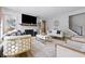 Airy living room featuring plush seating, a fireplace, and stylish modern decor at 3999 Kensington Dr, Danville, IN 46122