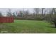 A large backyard with a wood fence, offering a private outdoor space at 4063 Orchard Valley Blvd, Indianapolis, IN 46235