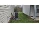 The exterior of the house features an HVAC unit situated in the grassy backyard at 4063 Orchard Valley Blvd, Indianapolis, IN 46235