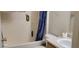 Bathroom featuring a shower and tub combination with a sink and toilet at 4063 Orchard Valley Blvd, Indianapolis, IN 46235