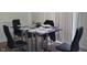 Dining area featuring a black table with seating for four, great for Gathering meals at 4063 Orchard Valley Blvd, Indianapolis, IN 46235