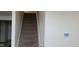 Stairway leading to the upper level, offering easy access to the home's living spaces at 4063 Orchard Valley Blvd, Indianapolis, IN 46235