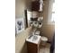 Small bathroom with a sink and mirror at 408 N Colorado Ave, Indianapolis, IN 46201
