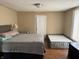 Bedroom with a bed and a wooden floor at 408 N Colorado Ave, Indianapolis, IN 46201
