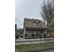 Charming home featuring a cozy front porch and well-maintained exterior at 408 N Colorado Ave, Indianapolis, IN 46201