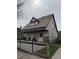 Lovely home with a cozy porch and a well-kept front yard at 408 N Colorado Ave, Indianapolis, IN 46201