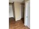 Hallway area featuring hardwood floors and doors at 408 N Colorado Ave, Indianapolis, IN 46201