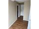 Hallway area featuring hardwood floors and neutral paint at 408 N Colorado Ave, Indianapolis, IN 46201