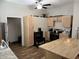 Kitchen with a brick-accented island and stainless steel appliances at 408 N Colorado Ave, Indianapolis, IN 46201