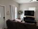 Comfortable living room with a large sectional sofa, creating a welcoming atmosphere at 408 N Colorado Ave, Indianapolis, IN 46201