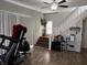 Living room with hardwood floors and staircase at 408 N Colorado Ave, Indianapolis, IN 46201
