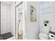 Modern bathroom featuring a walk-in shower with black and white tiles and sleek fixtures at 415 S Oxford St, Indianapolis, IN 46201