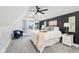 Cozy bedroom featuring a queen-sized bed, accent chair, and stylish decor creating a relaxing ambiance at 415 S Oxford St, Indianapolis, IN 46201