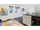 Bonus room featuring a mini-bar, and two windows with natural light at 415 S Oxford St, Indianapolis, IN 46201