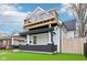 Charming home featuring a unique rooftop deck and well-manicured front yard at 415 S Oxford St, Indianapolis, IN 46201