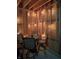 Cozy garage lounge area with seating, table, and decorative string lights at 415 S Oxford St, Indianapolis, IN 46201