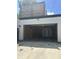 A clean two car garage with white trim and overhead light at 415 S Oxford St, Indianapolis, IN 46201