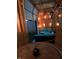 Relaxing garage lounge area with blue cushioned seating and patio heater at 415 S Oxford St, Indianapolis, IN 46201