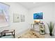 Bright home office featuring a modern desk, chair, and art, creating a functional workspace at 415 S Oxford St, Indianapolis, IN 46201