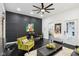 Stylish living room featuring modern decor, trendy wall art and an abundance of natural light at 415 S Oxford St, Indianapolis, IN 46201