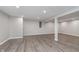 Finished basement features new flooring and recessed lighting at 4421 Brittany Dr, Zionsville, IN 46077