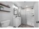 Updated bathroom with stylish vanity, framed mirror, and walk-in shower at 4421 Brittany Dr, Zionsville, IN 46077
