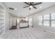 Cozy living room features fireplace, carpet, and lots of natural light at 4421 Brittany Dr, Zionsville, IN 46077