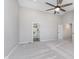 Large bedroom featuring neutral walls and ceilings with a walk-in closet and en-suite bathroom at 4421 Brittany Dr, Zionsville, IN 46077