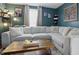 Comfortable living room with a large sectional sofa, perfect for relaxing at 443 S Arlington Ave, Indianapolis, IN 46219