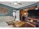 Cozy living room featuring modern furnishings and a stylish sliding barn door at 443 S Arlington Ave, Indianapolis, IN 46219