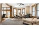 Cozy living room with comfortable seating, hardwood floors, and abundant natural light at 4849 Central Ave, Indianapolis, IN 46205