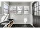 Welcoming mud room with natural light, a bench, and storage space at 4849 Central Ave, Indianapolis, IN 46205