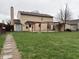 Large backyard with a patio and pergola, perfect for outdoor entertaining at 5814 Lakefield Dr, Indianapolis, IN 46254