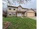 Inviting two-story home with a well-maintained lawn and tasteful landscaping enhancing its appeal at 5814 Lakefield Dr, Indianapolis, IN 46254