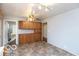 A spacious kitchen featuring ample cabinets and a dining area at 5838 W Henry St, Indianapolis, IN 46241