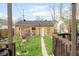 Spacious backyard view from deck, showing the garage and lawn at 616 N Bancroft St, Indianapolis, IN 46201