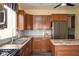 Gourmet kitchen includes stainless appliances, granite counters, and subway tile backsplash at 616 N Bancroft St, Indianapolis, IN 46201